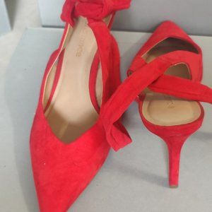 Brazilian red suede pumps
